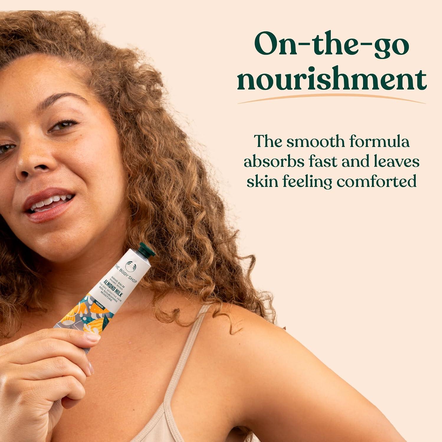 imageThe Body Shop Pink Grapefruit Hand Cream Citrus Fragrance OntheGo Hydration Vegan 10 ozAlmond Milk Honey